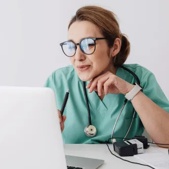 A person looking at a laptop